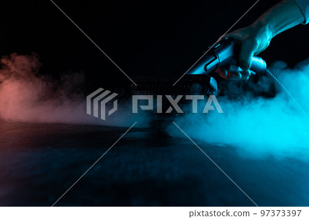 steam cleaner for cleaning the house, steam erupts from the brush. steam cleaner for cleaning the house, steam erupts from the brush. 97373397