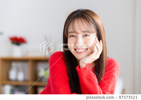 Young woman relaxing in the living room 97373521
