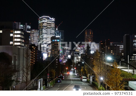 Night view of Shibuya seen from the Yoyogi Park pedestrian bridge in front of Harajuku Station Night view of Shibuya seen from the Yoyogi Park pedestrian bridge in front of Harajuku Station 97374531