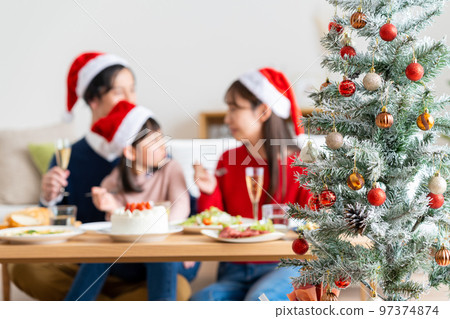 young family at christmas young family at christmas 97374874