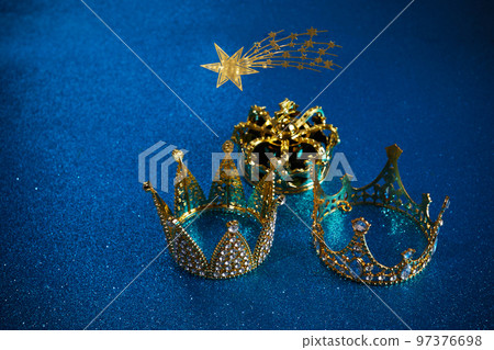 Three crowns of the three wise men with star over blue background. For Reyes Magos day and Happy Epiphany day. Three crowns of the three wise men with star over blue background. For Reyes Magos day and Happy Epiphany day. 97376698