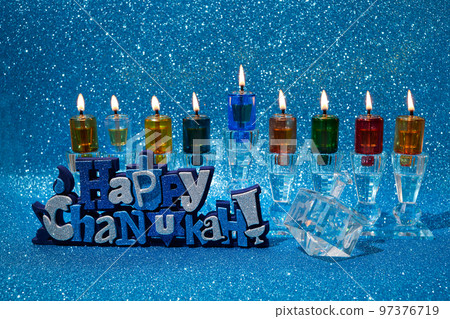 Jewish holiday Hanukkah background with menorah and dreidel with letters Gimel and Nun. Jewish holiday Hanukkah background with menorah and dreidel with letters Gimel and Nun. 97376719