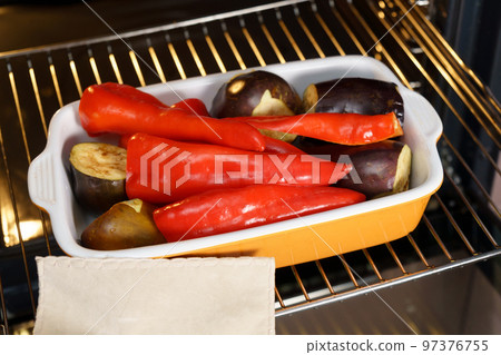 Roasted Red peppers and eggplant for Ajvar. Tasty spread popular in the Balkans Serbia Macedonia Bosnia and Croatia 97376755