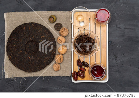 Traditional Chinese Puer tea, dry the tea. Topview, tea ceremony, black background 97376785