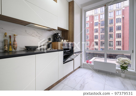 Large white and black luxury kitchen interior Large white and black luxury kitchen interior 97379531