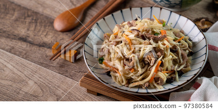 Pork julienne fried with water bamboo shred. Delicious homemade food. 97380584