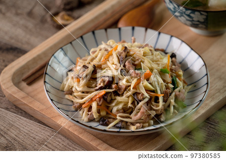 Pork julienne fried with water bamboo shred. Delicious homemade food. 97380585
