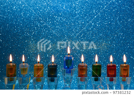 Jewish holiday Hanukkah background with menorah -traditional candelabra and candles 97381232