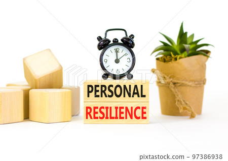 Personal resilience symbol. Concept word Personal resilience on wooden blocks. Beautiful white table white background. Black alarm clock. Business psychological personal resilience concept. Copy space 97386938