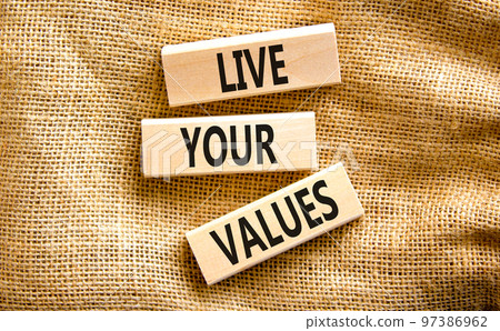Live your values symbol. Concept words Live your values on wooden blocks. Beautiful canvas table canvas background. Business, psychological and live your values concept. Copy space. Live your values symbol. Concept words Live your values on wooden blocks. Beautiful canvas table canvas background. Business, psychological and live your values concept. Copy space. 97386962