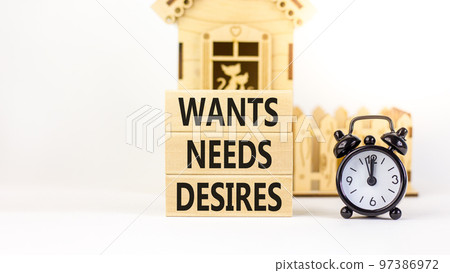 Wants needs and desires symbol. Concept words Wants Needs Desires on wooden blocks. Black alarm clock. Beautiful white background. Business, psychological wants needs and desires concept. Copy space. Wants needs and desires symbol. Concept words Wants Needs Desires on wooden blocks. Black alarm clock. Beautiful white background. Business, psychological wants needs and desires concept. Copy space. 97386972
