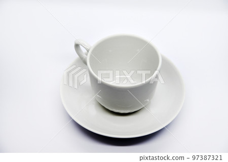 Tea couple on a white background. Porcelain service close-up. A teacup and saucer. 97387321