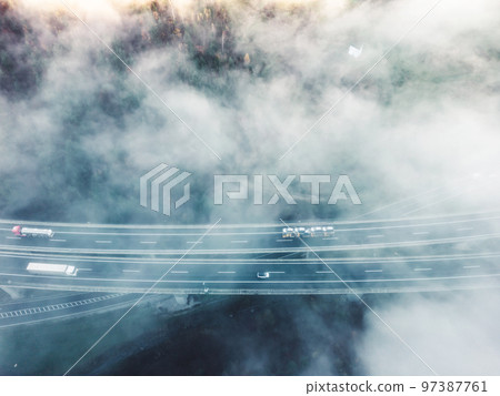 Fog blocking the view of the interstate trough the country side of Slovenia Fog blocking the view of the interstate trough the country side of Slovenia 97387761