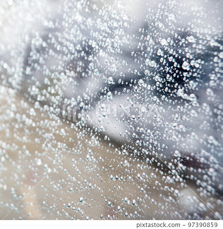 Raindrops on the car wondow Raindrops on the car wondow 97390859