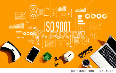 ISO 9001 theme with electronic gadgets and office supplies 97391942