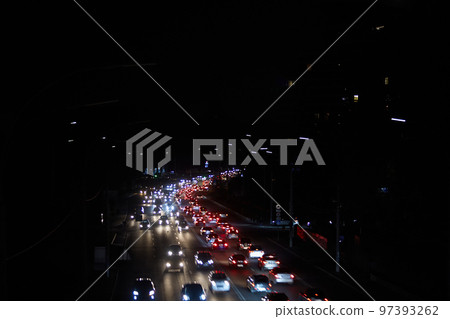 Kyiv, Ukraine - December 16, 2022: Blackout in the Ukrainian capital Kyiv. Capital streets without street lighting. Only the lights of passing cars are visible Kyiv, Ukraine - December 16, 2022: Blackout in the Ukrainian capital Kyiv. Capital streets without street lighting. Only the lights of passing cars are visible 97393262