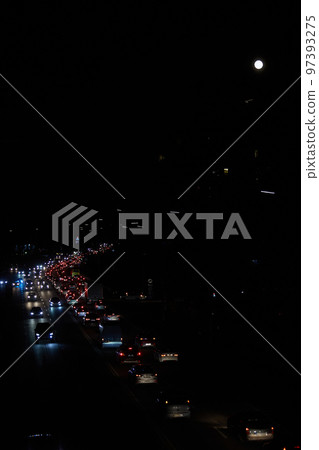 Kyiv, Ukraine - December 16, 2022: Blackout in the Ukrainian capital Kyiv. Capital streets without street lighting. Only the lights of passing cars are visible Kyiv, Ukraine - December 16, 2022: Blackout in the Ukrainian capital Kyiv. Capital streets without street lighting. Only the lights of passing cars are visible 97393275