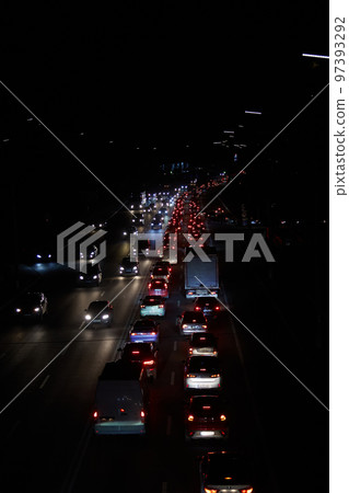 Kyiv, Ukraine - December 16, 2022: Blackout in the Ukrainian capital Kyiv. Capital streets without street lighting. Only the lights of passing cars are visible Kyiv, Ukraine - December 16, 2022: Blackout in the Ukrainian capital Kyiv. Capital streets without street lighting. Only the lights of passing cars are visible 97393292