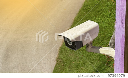 Old and dirty surveillance camera but it is still active installed at a house to provide safety for its inhabitants Old and dirty surveillance camera but it is still active installed at a house to provide safety for its inhabitants 97394079