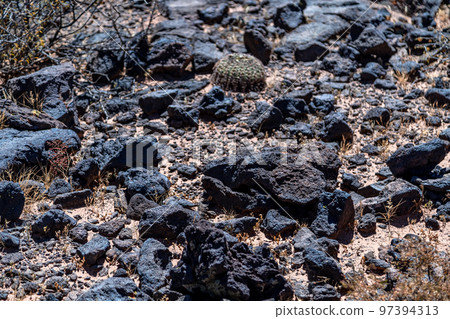 black lava stones in mountain terrain black lava stones in mountain terrain 97394313