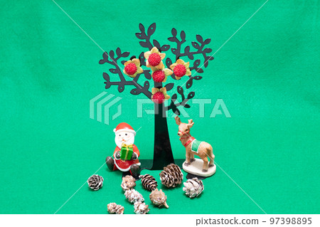 Miniature Santa and Christmas Tree Table Photo 97398895