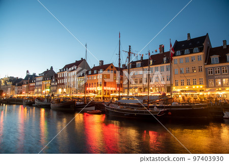 Beautiful night view of Nyhavn in Copenhagen, the capital of Denmark Beautiful night view of Nyhavn in Copenhagen, the capital of Denmark 97403930