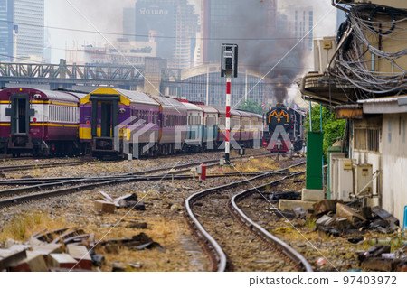 Thai Railways steam locomotive Pacific 824 departing from Hua Lamphong Station Thai Railways steam locomotive Pacific 824 departing from Hua Lamphong Station 97403972