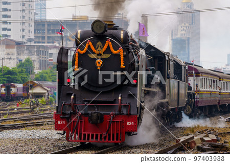 Thai Railways steam locomotive Pacific 824 departing from Hua Lamphong Station 97403988