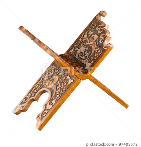 A vintage oriental stand book reading isolated on a white background. Central Asia, Uzbekistan 97405572