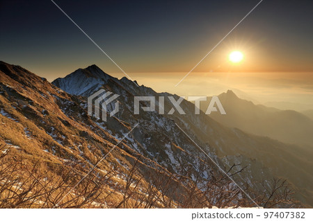 South face and sunrise of Mt. Houki in Tottori prefecture with snow 97407382