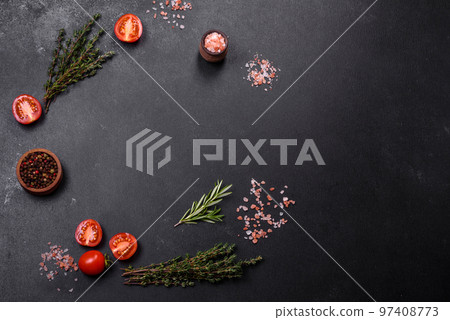 Fresh raw pork meat on the ribs with spices and herbs on a wooden cutting board 97408773