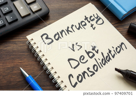 Page of a notepad with an inscription Bankruptcy vs debt consolidation. Page of a notepad with an inscription Bankruptcy vs debt consolidation. 97409701