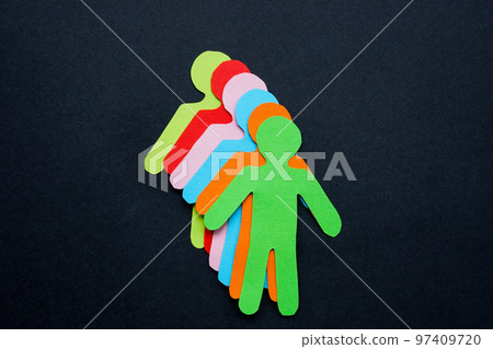 Figures of people from colored paper as a symbol of diversity. Figures of people from colored paper as a symbol of diversity. 97409720