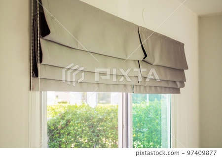 Roman blind curtain decoration in living room interior Roman blind curtain decoration in living room interior 97409877