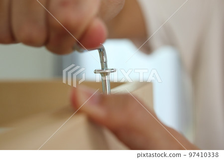 Assembly wooden furniture at home using screw allen 97410338