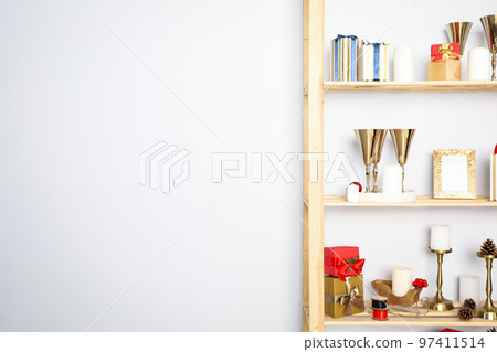 Shelving with different Christmas accessories, space for text Shelving with different Christmas accessories, space for text 97411514