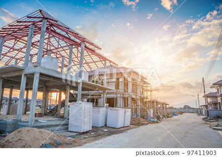 construction residential new house in progress at building site construction residential new house in progress at building site 97411903