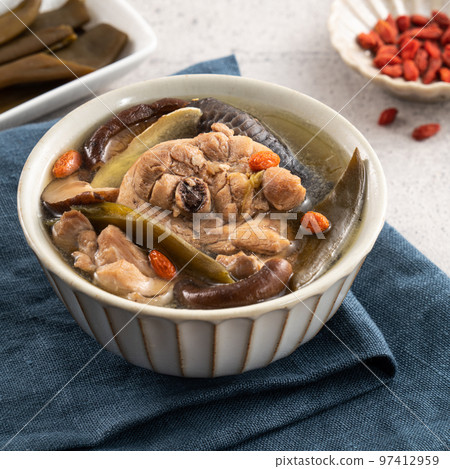 Delicious Taiwanese peeled green chili pepper chicken soup with mushroom and goji berry Delicious Taiwanese peeled green chili pepper chicken soup with mushroom and goji berry 97412959