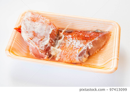 Red fish pickled in sake lees in a food tray Red fish pickled in sake lees in a food tray 97413099