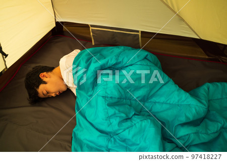 child sleeping in a tent child sleeping in a tent 97418227