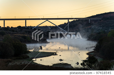 High speed train bridge over the mist High speed train bridge over the mist 97418545