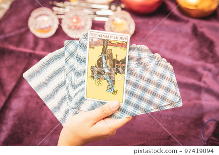 woman doing tarot reading woman doing tarot reading 97419094