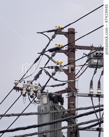 Utility poles and overhead distribution lines 97419948