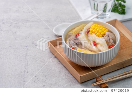 Taiwanese homemade delicious chicken soup with pineapple, bitter gourd and sweet corn Taiwanese homemade delicious chicken soup with pineapple, bitter gourd and sweet corn 97420019