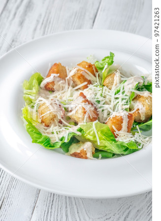 Portion of Caesar salad Portion of Caesar salad 97421263