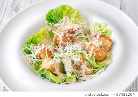 Portion of Caesar salad Portion of Caesar salad 97421264