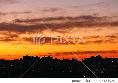 Sun rising over Namsan Tower Sun rising over Namsan Tower 97421920