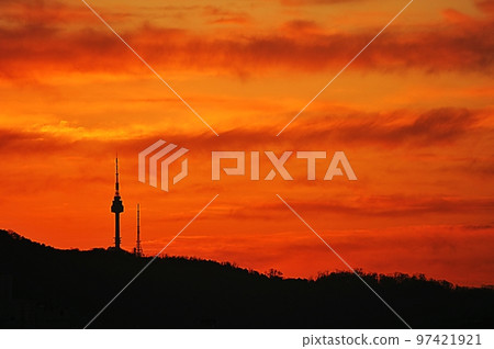 Sun rising over Namsan Tower 97421921