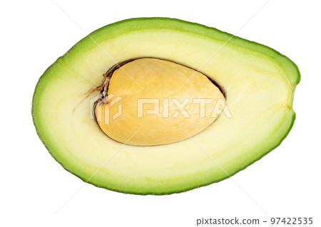 Avocado cut in half with bone isolated on white. Fresh vegetables. Avocado cut in half with bone isolated on white. Fresh vegetables. 97422535