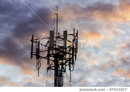 Silhouettes of tower antenna. 97423957